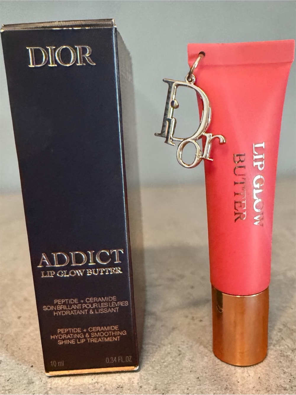 Dior Addict Lip Glow Butter — Lychee Tube with Gold Charm